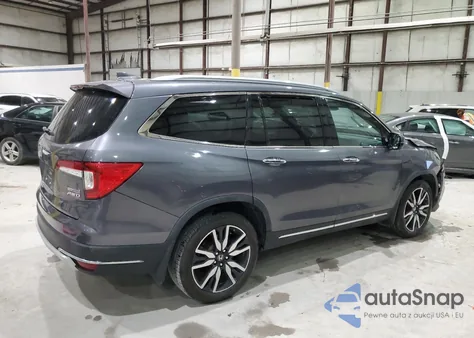 2021 Honda Pilot Touring z USA, uszkodzony, nr VIN 5FNYF6H65MB066273
